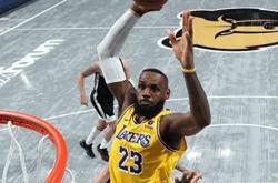 爱游戏app-湖人轻取灰熊，詹姆斯季后赛首秀发挥稳定